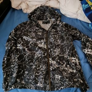 A men's Forever 21 black and white windbreaker w/ hood. Size M